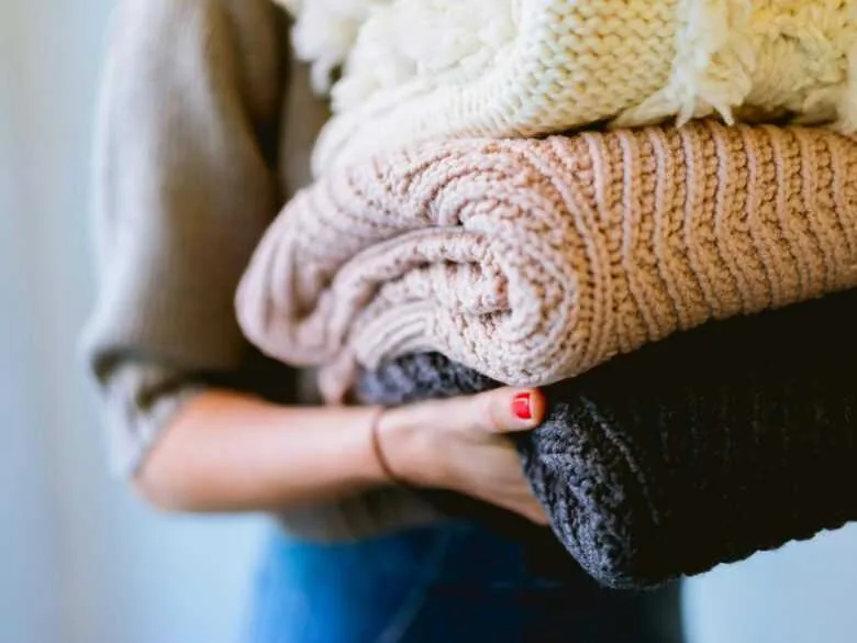 Freshly laundered folded sweaters